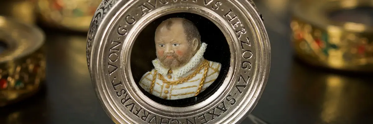 Spielstein mit dem Portrait eines Mannes