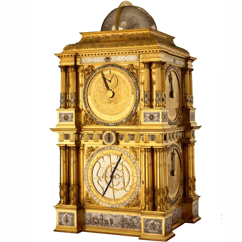 reich verzierte, goldene Uhr mit mehreren Ziffernblättern